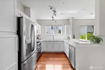 Additional view of kitchen with new SS appliances
