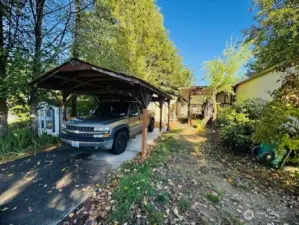 1-car carport and yard space.