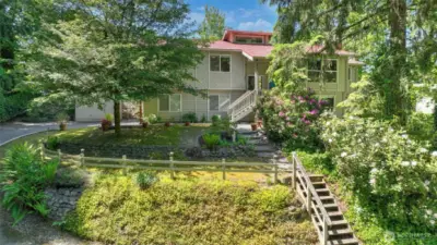 Private, gated retreat on 1+ acre, where luxury, comfort & functionality come together. This  expansive home offers a resort-style living experience, featuring a movie theater (equipment included) & a gym that  easily converts to a 4th bedroom. The chef’s kitchen impresses w/ample storage & prep space, plus large island perfect  for entertaining. Multiple living areas, including a spacious bonus room, provide flexibility for multi-gen living or  remote work. Unwind in the spa-like primary, enjoy the hot tub, or explore the scenic Soos Creek Trail just steps from  your door. Beautifully landscaped grounds, an oversized 2-car garage & 2-story shed complete this exceptional  property—minutes from schools, shops & freeways. A one-of-a-kind sanctuary!