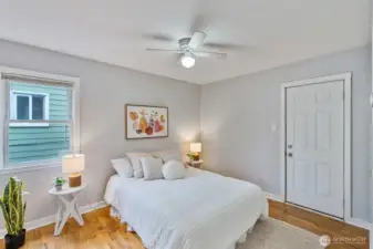 Primary bedroom with backyard access