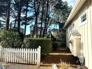 Side of home shows you have lots of privacy between cottages