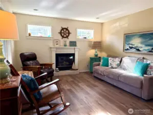 Luxury vinyl plank flooring and all furnishings inckuded