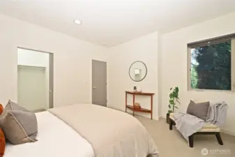 Has slider to outside and walk-in closet.