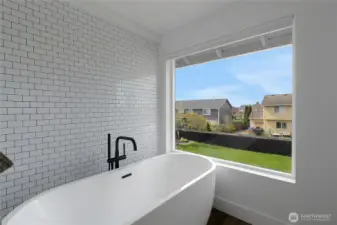 Luxurious Free Standing Bath Tub to relax in the Primary Bathroom