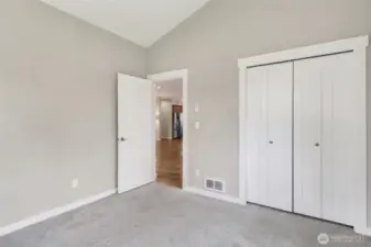 Second bedroom looking out to the hallway.