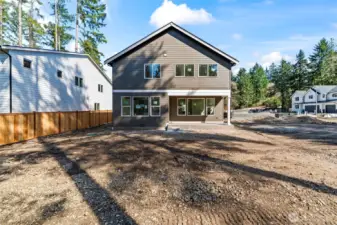 Rear yard will be landscaped and fenced.