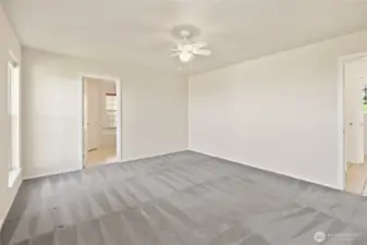 Primary bedroom with attached bathroom