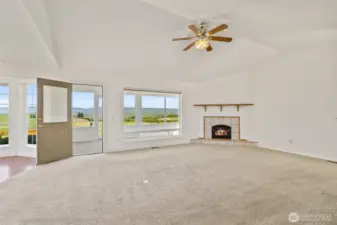 Off the great room is an enclosed porch with windows all around!