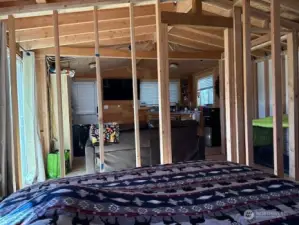 view unfinished walls into kitchen living area