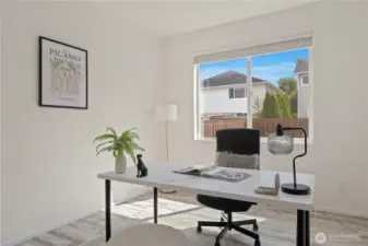 Main floor bedroom staged as an office