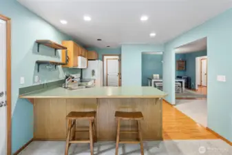 Morning room side also features spacious breakfast bar and access to your deck