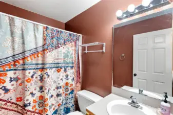Full bath right outside the second main floor bedroom.  So great for guests!