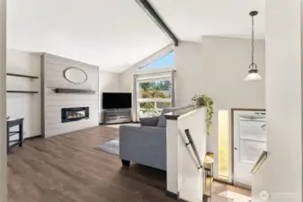 Spacious living area with vaulted ceilings
