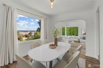 More large windows and expansive views from the dining area.
