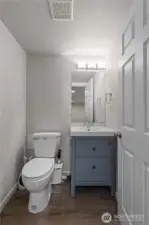 Half bath, conveniently located in the finished, walkout basement.