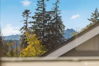 Peak-a-boo views of the Olympic Mountains from Primary Bedroom