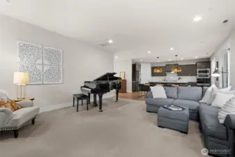 An open and flowing floor plan offers endless possibilities, easily accommodating oversized furniture while allowing you to personalize the space.