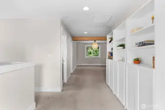 A wide hallway space opens up to a large loft area, perfect for a media room, play room or flex space to fit your lifestyle.