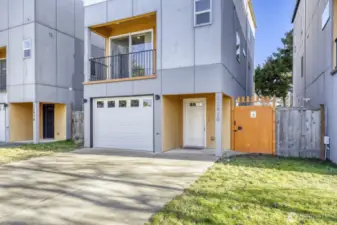 Front door, garage, front of home balcony
