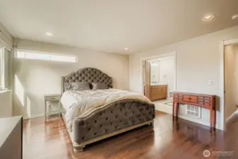 Primary Bedroom w/ attached private bathroom