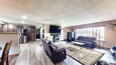Sunken living room with propane gas fireplace