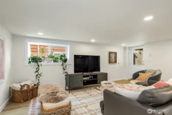 Lower-level living area with exterior access...