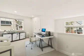 Upstairs bonus space is great for a home office or workout space