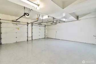 2 car garage w/ new expoxy floors and extra storage space