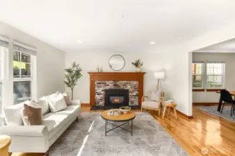 Light filled living room has an open flow to the dining area creates an ideal layout