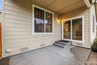 The Back Patio is covered, located steps to the kitchen and a great place to sit and enjoy the back yard!