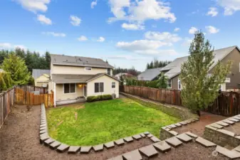 The Terraced Back Yard brings so many possibilities! Room for a Flower Garden, Veggie Garden or maybe add Fruit Trees! Minimal is great too!