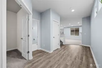 Large Open Foyer! New Flooring! High-set windows bring in the light and maintain privacy.