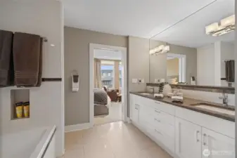 5 piece bath with marble counters and heated floors.