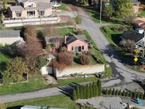 You can see the one car garage below the garden shed to the lower left of the home.