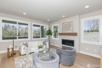 Gorgeous oversized gas fireplace with floor to ceiling tile.