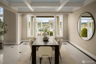 Dining framed by columns and coffered ceilings, aligned to Lake Washington through French doors.