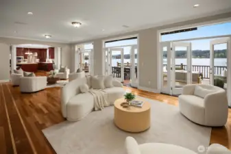Walls of French doors frame Lake Washington and open the living spaces to the waterfront deck.