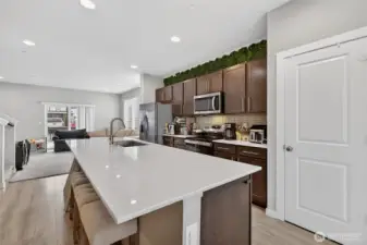 Beautiful quartz kitchen island with generous countertop space, perfect for entertaining