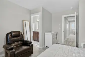 Master suite bedroom with walk-in closet, plush finishes, and a peaceful, sun-drenched layout