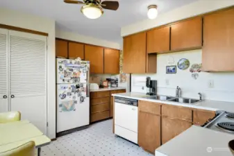Unit #3:   Large kitchen with lots of counterspace and small eating space with west-facing view window overlooking peek view of Olympic Mountains.
