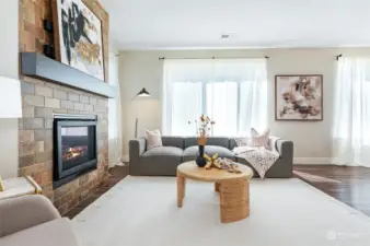 Family room with cozy gas fireplace.
