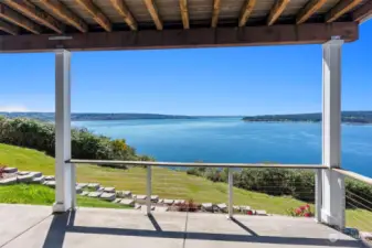 The lower patio, while covered, doesn't disappoint with the views. Stunning Mt Rainier graces you with her full glory making you feel like she is giving you a private show.