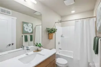 Photos are of model home in the same community.