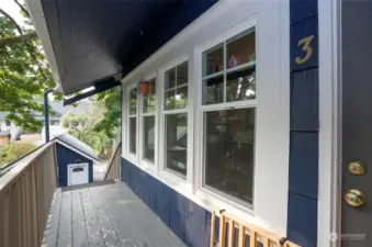 Large, covered deck space leading to the entrance for Unit 3.