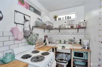 Unit 4 - Updated kitchen with stove and refrigerator.