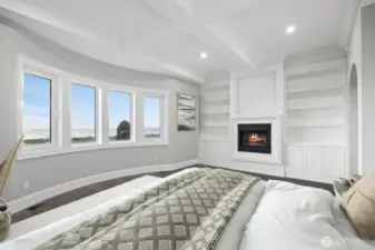 Huge primary bedroom with sweeping views & custom limestone fireplace