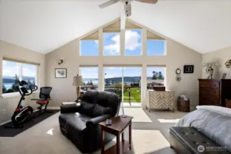 Vaulted ceilings and plenty of natural light with private balcony.