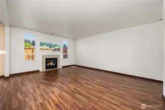 Light, bright living room with easy maintenance laminate flooring.