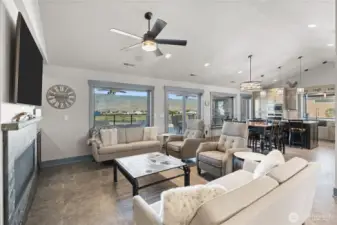 Living room open to dining room and kitchen. Great for entertaining.