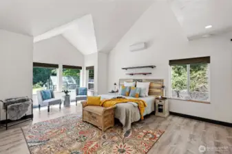 The primary suite is airy with lots of natural light pouring in. Lay in bed and check out the deer, eagles, or owls that share this oasis with you.